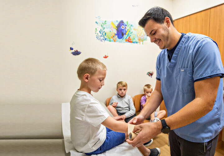 Children being treated for cuts